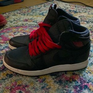 I’m selling red and black Air Jordan size 6Y worn a couple times good condition